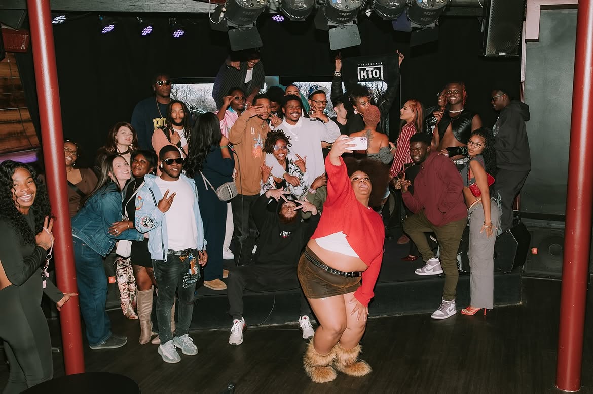 Crowd selfie on stage at Rap Café Vol. 2