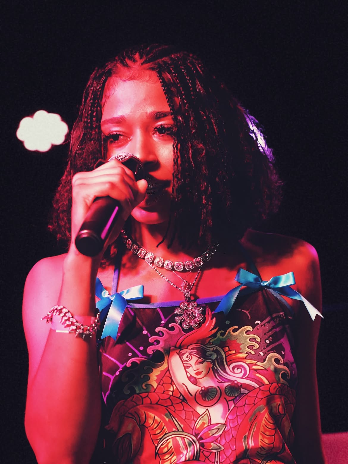 @roccxxiimusicc performing at Rap Café